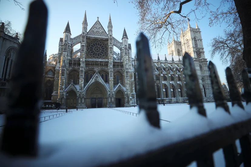 Snow covers the railings outside Westminster Abbey in London, Feb. 28, 2018. Photo: Hannah Mckay/Reuters via CNS